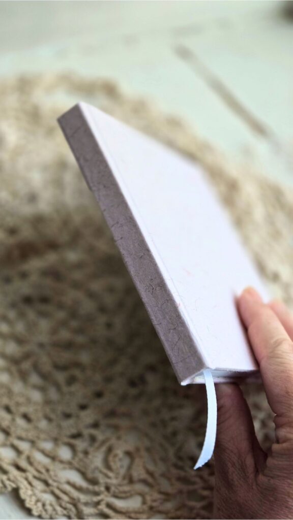 The spine of a handmade hardcover book