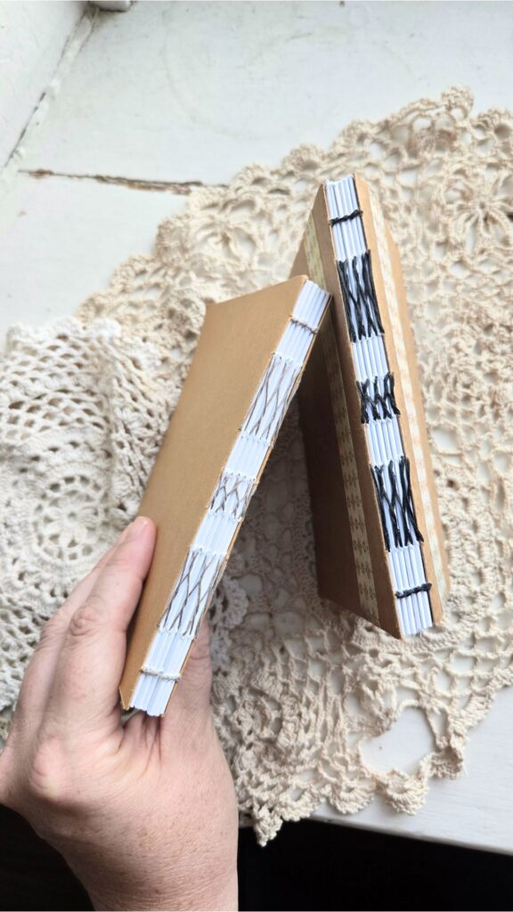 Two Hand sewn Journals